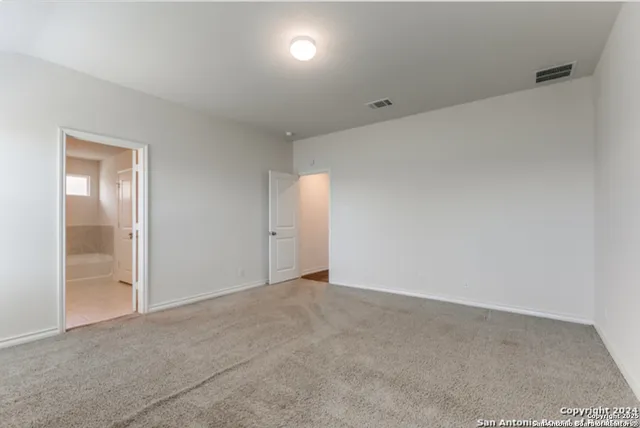an empty room with an entryway