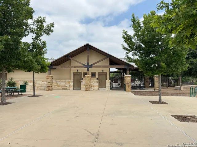 a view of a lake with a yard