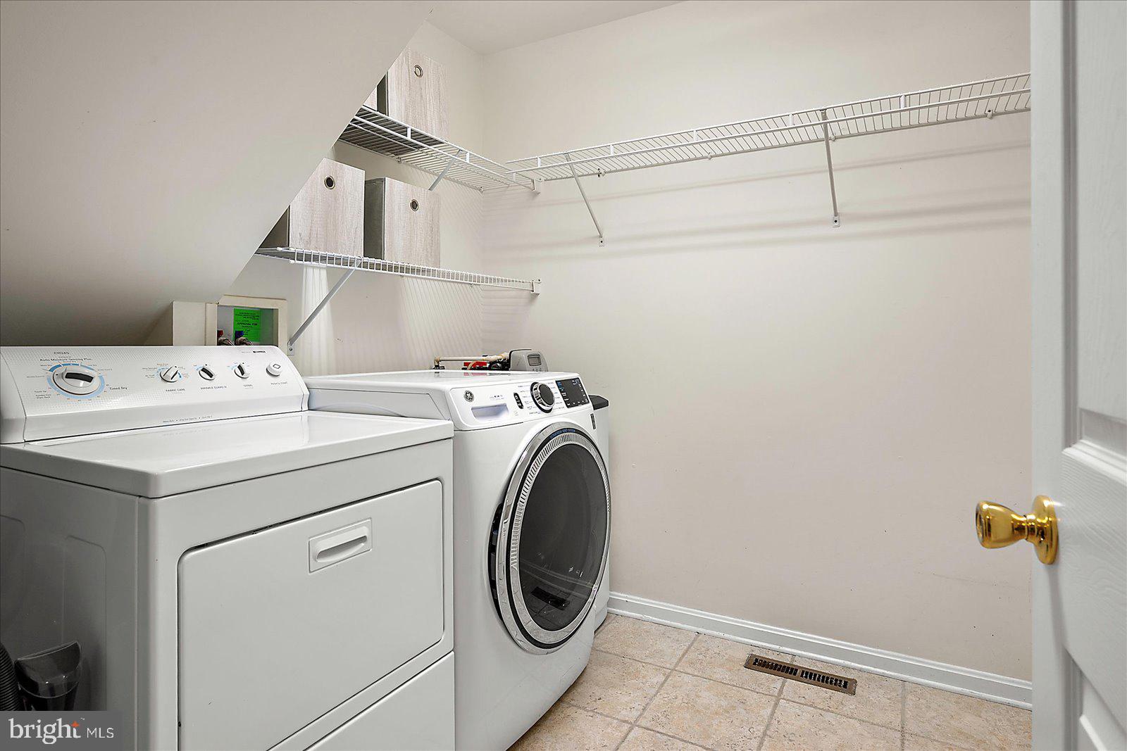 11531 Quillin Way Berlin, MD 21811 - Photo 51 of 73 Spacious Laundry Room with Sink and Cabinets