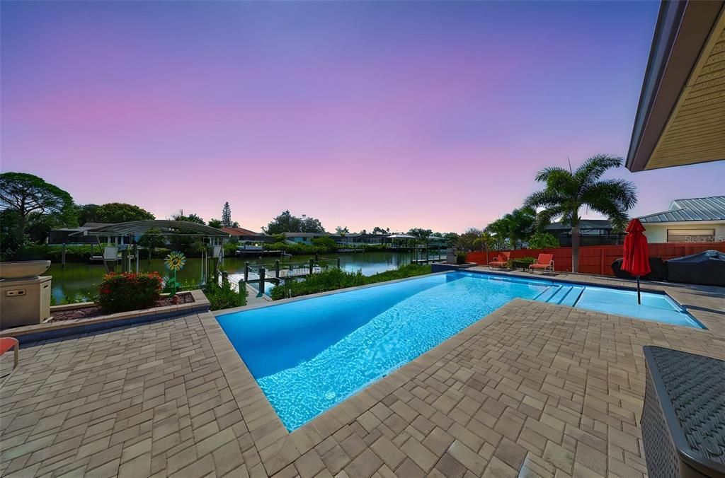 914 Chipaway Drive Apollo Beach, FL 33572 - Photo 31 of 49 a view of a swimming pool with lounge chair