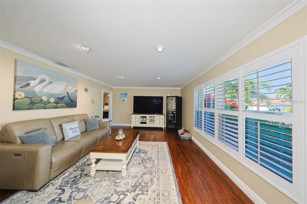 914 Chipaway Drive Apollo Beach, FL 33572 - Photo 34 of 49 a living room with furniture and a flat screen tv