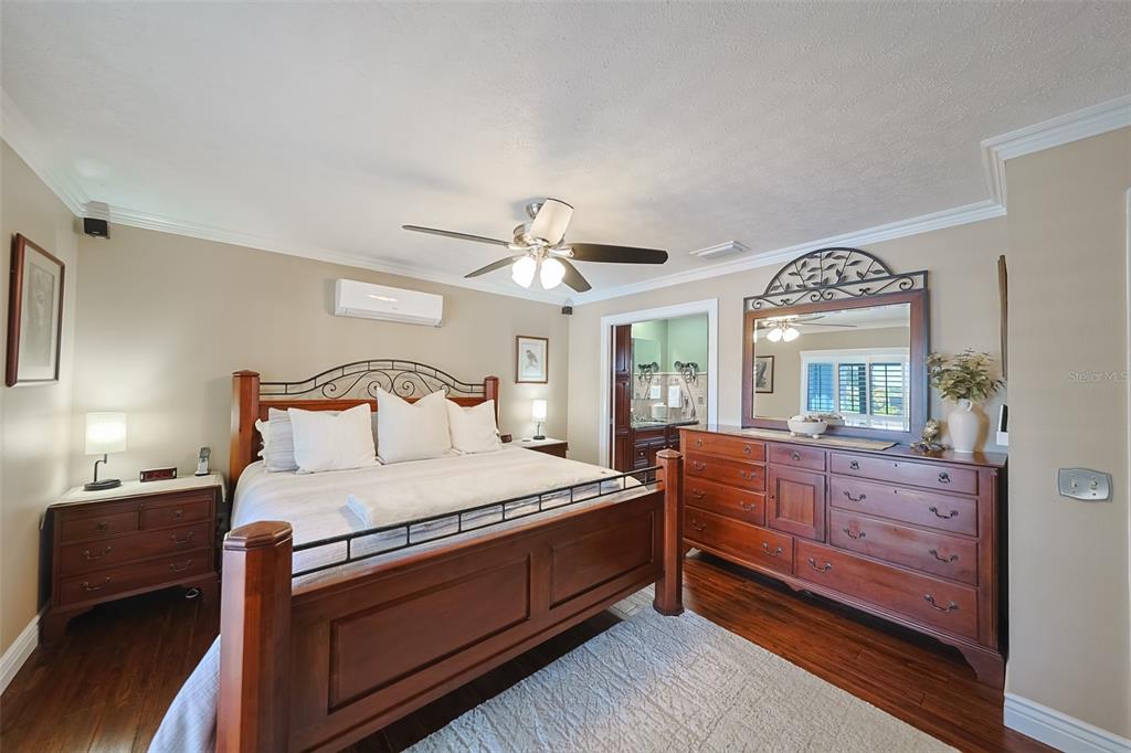 914 Chipaway Drive Apollo Beach, FL 33572 - Photo 35 of 49 a bedroom with a bed and a dresser