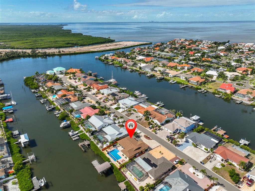 914 Chipaway Drive Apollo Beach, FL 33572 - Photo 49 of 49 an aerial view of lake and residential houses with outdoor space