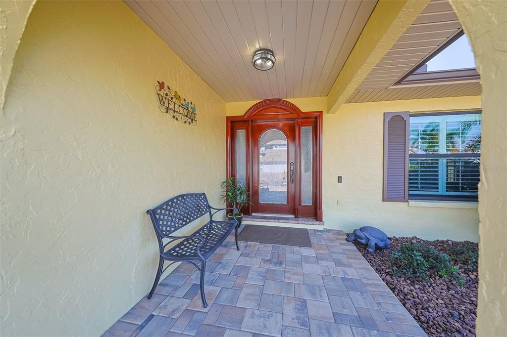 914 Chipaway Drive Apollo Beach, FL 33572 - Photo 5 of 49 a view of front door of house with outdoor seating