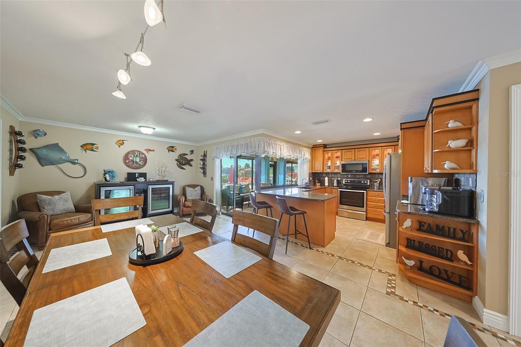 914 Chipaway Drive Apollo Beach, FL 33572 - Photo 10 of 49 a living room with furniture and a flat screen tv