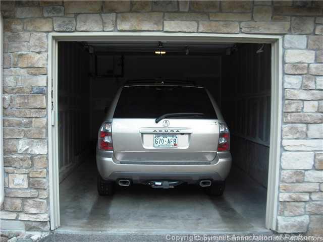 110 Beaver Lodge Road, Unit 103 Frisco, CO 80443 - Photo 24 of 25 a car parked in a parking room