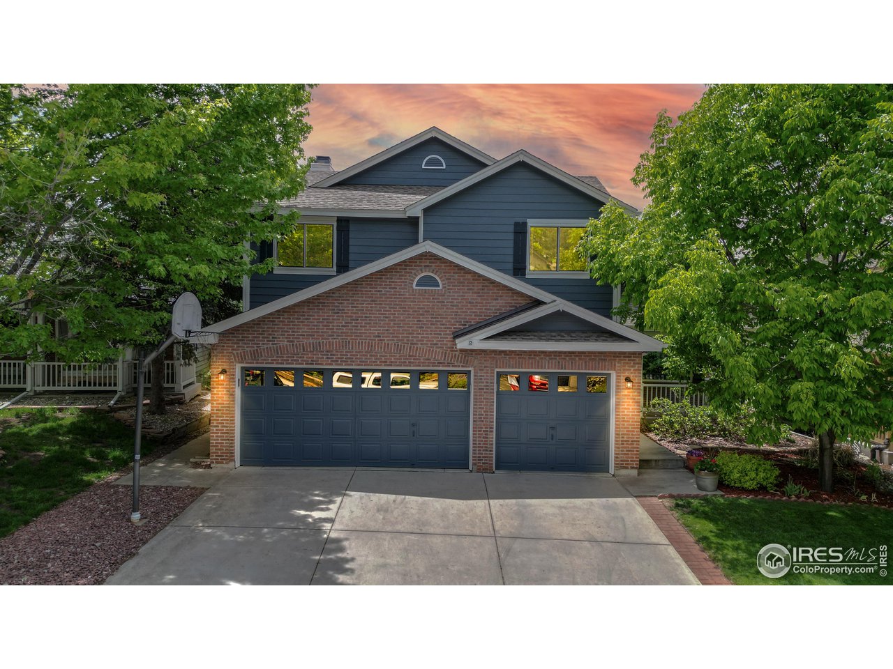9951 South Spring Hill Place Highlands Ranch, CO 80129 - Photo 1 of 40 a black and white photo of a house