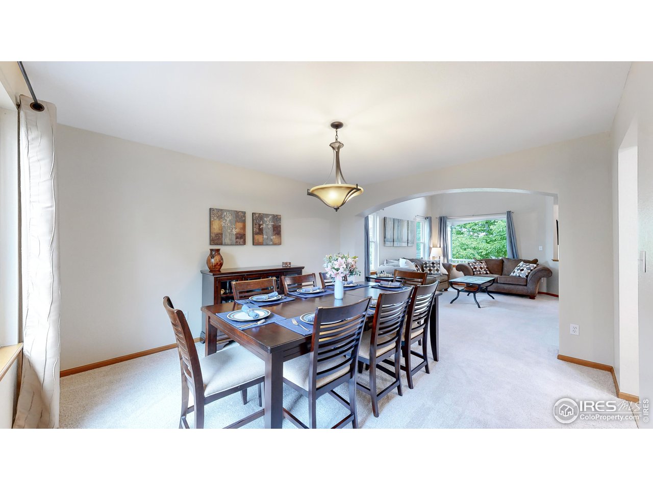 9951 South Spring Hill Place Highlands Ranch, CO 80129 - Photo 10 of 40 a dining room with furniture and window