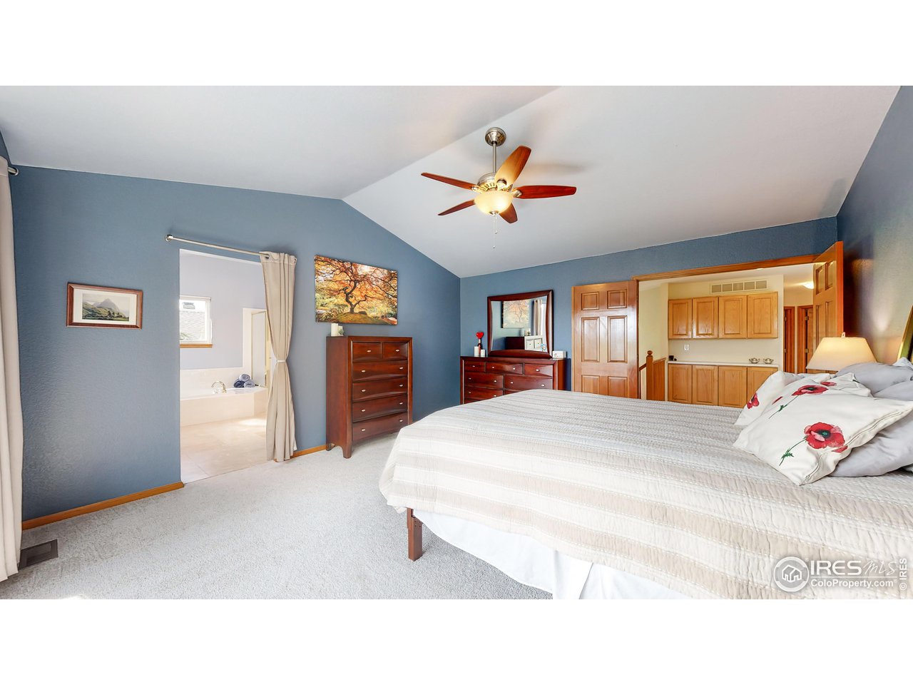 9951 South Spring Hill Place Highlands Ranch, CO 80129 - Photo 12 of 40 a bedroom with a bed and a large window