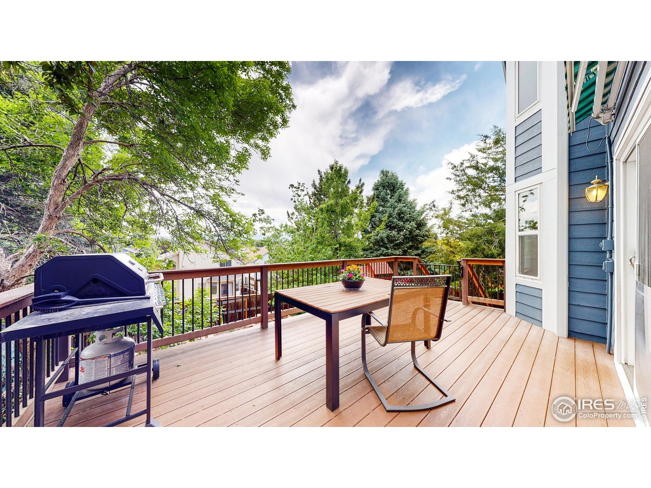 9951 South Spring Hill Place Highlands Ranch, CO 80129 - Photo 32 of 40 a balcony with table and chairs