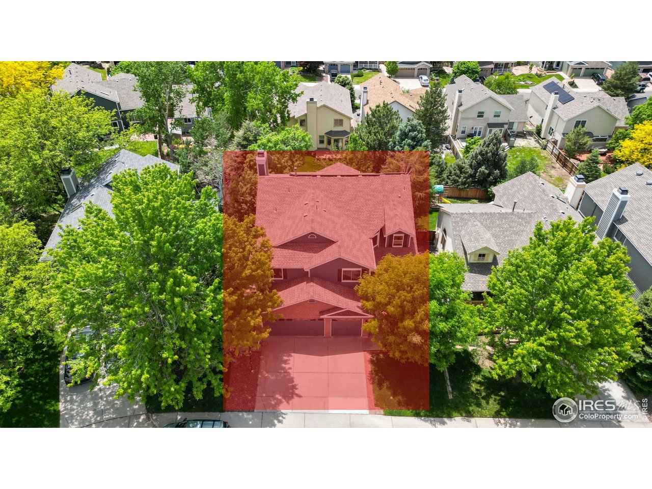 9951 South Spring Hill Place Highlands Ranch, CO 80129 - Photo 35 of 40 an aerial view of a house with a yard