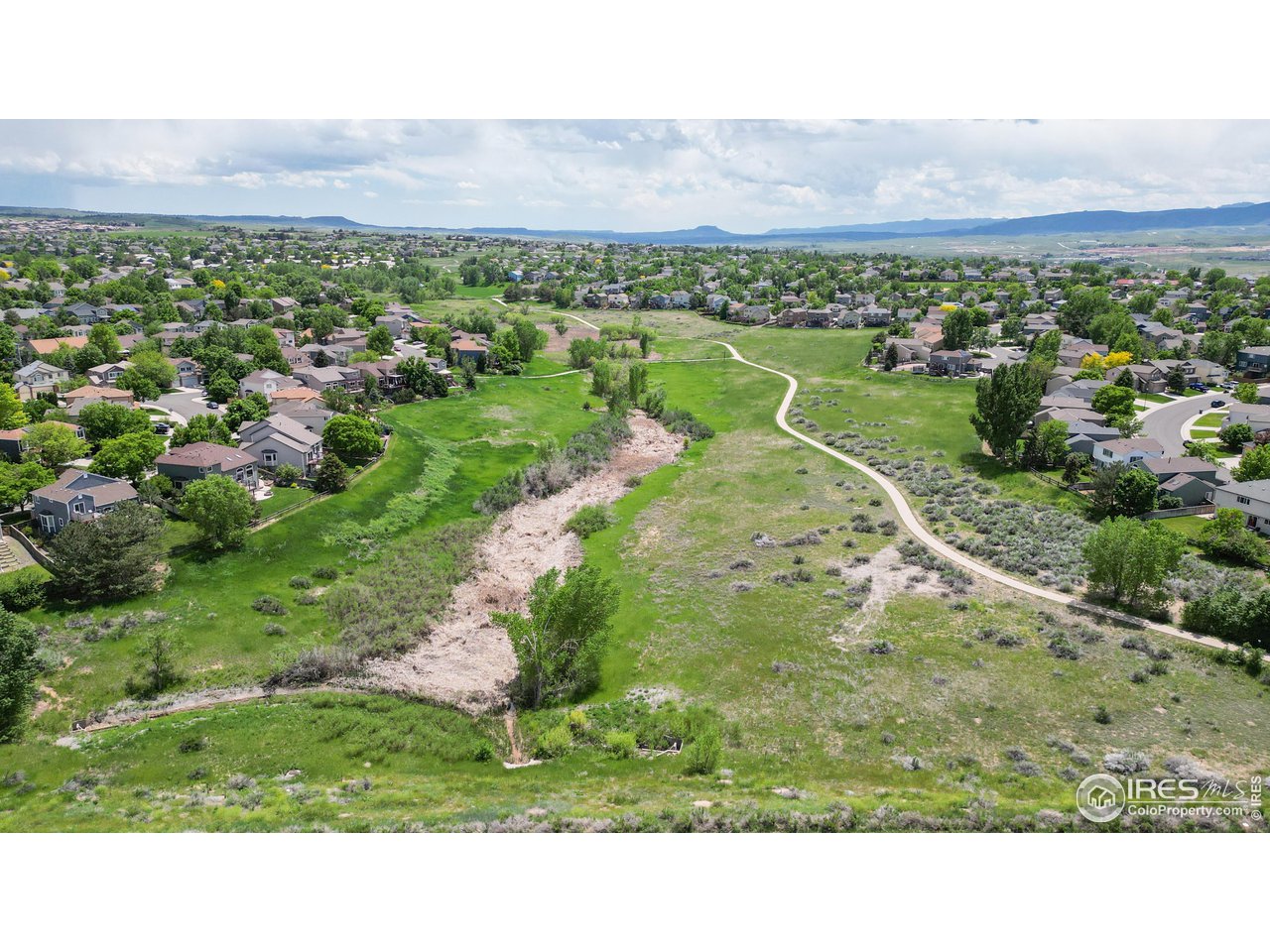 9951 South Spring Hill Place Highlands Ranch, CO 80129 - Photo 38 of 40 a picture of city view and mountain view