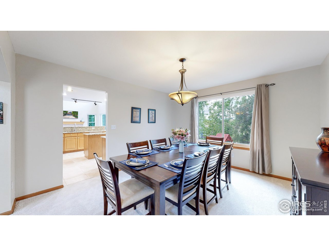 9951 South Spring Hill Place Highlands Ranch, CO 80129 - Photo 9 of 40 a view of a dining room with furniture window and outside view