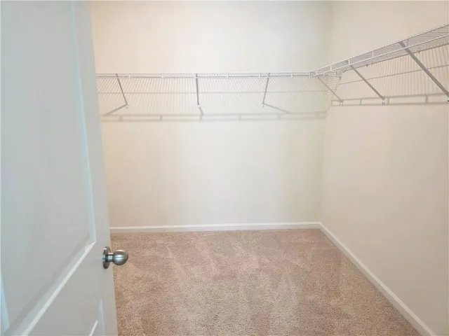 a view of a room with racks on the wall