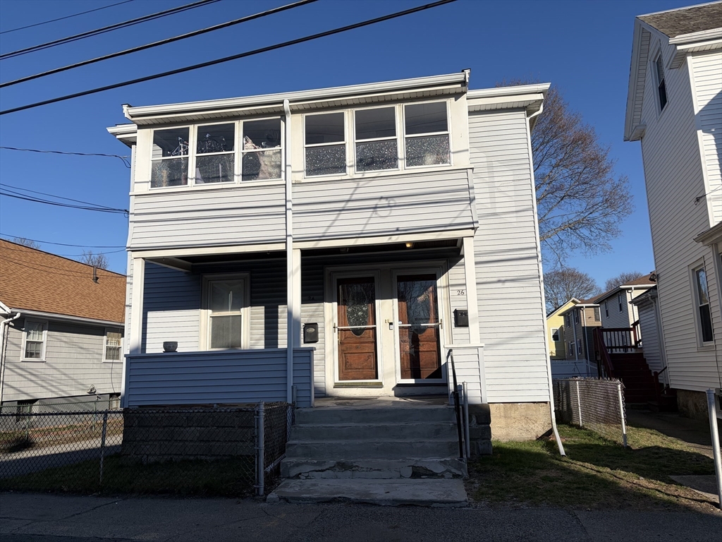 24 French Street, Unit 24 Watertown, MA 02472 - Photo 2 of 9 a front view of a house with wooden stairs