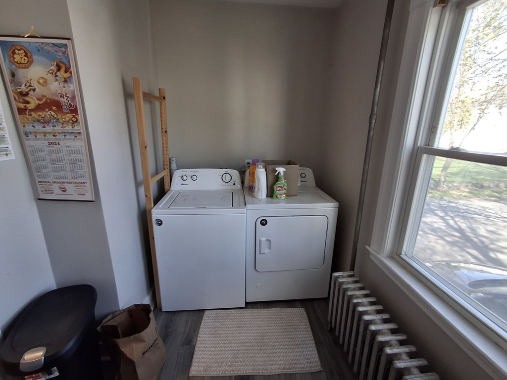 24 French Street, Unit 24 Watertown, MA 02472 - Photo 8 of 9 a utility room with dryer and washer