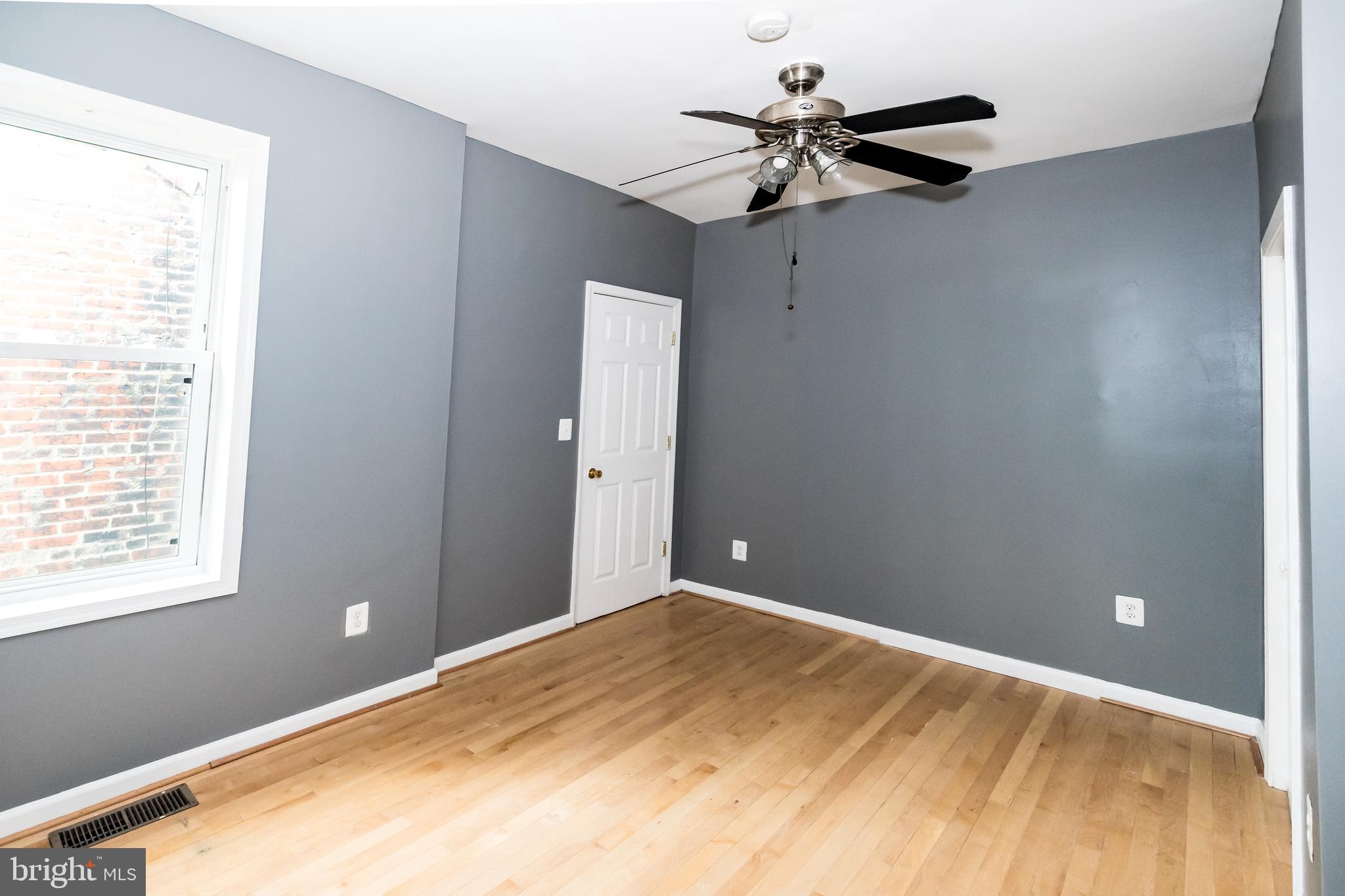 1427 New Jersey Avenue Northwest Washington, DC 20001 - Photo 11 of 29 a view of a room with a ceiling fan and a window