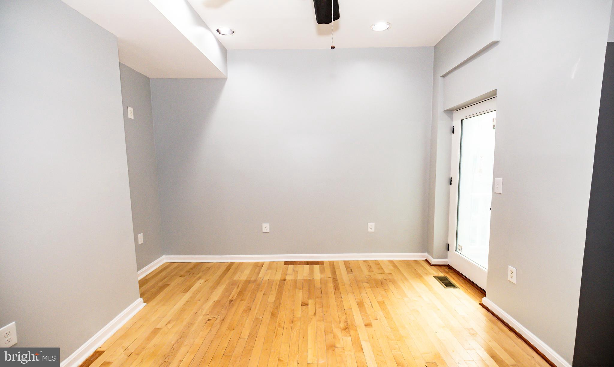 1427 New Jersey Avenue Northwest Washington, DC 20001 - Photo 19 of 29 a view of a room with wooden floor and bathroom