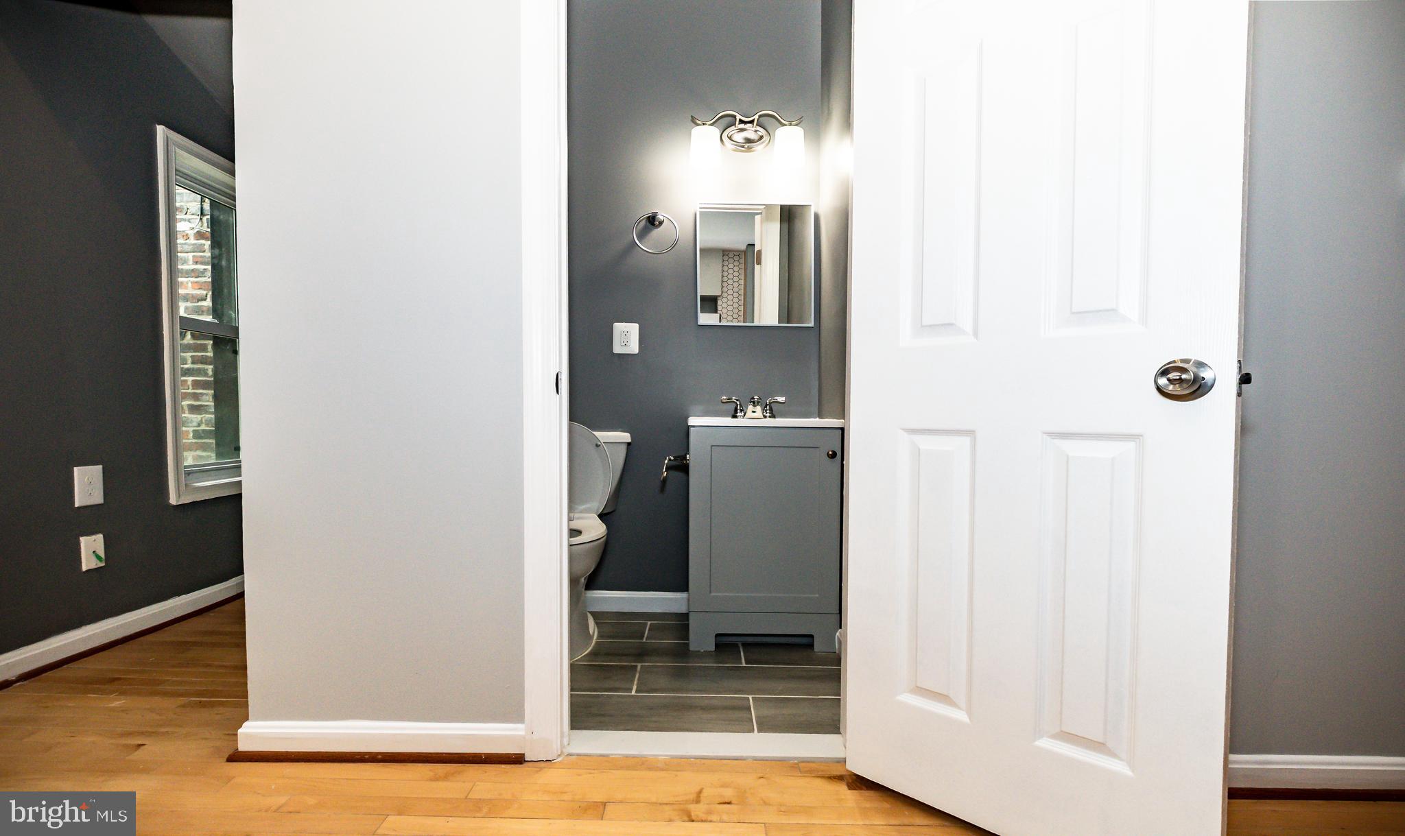 1427 New Jersey Avenue Northwest Washington, DC 20001 - Photo 20 of 29 a view of a bathroom from the hallway