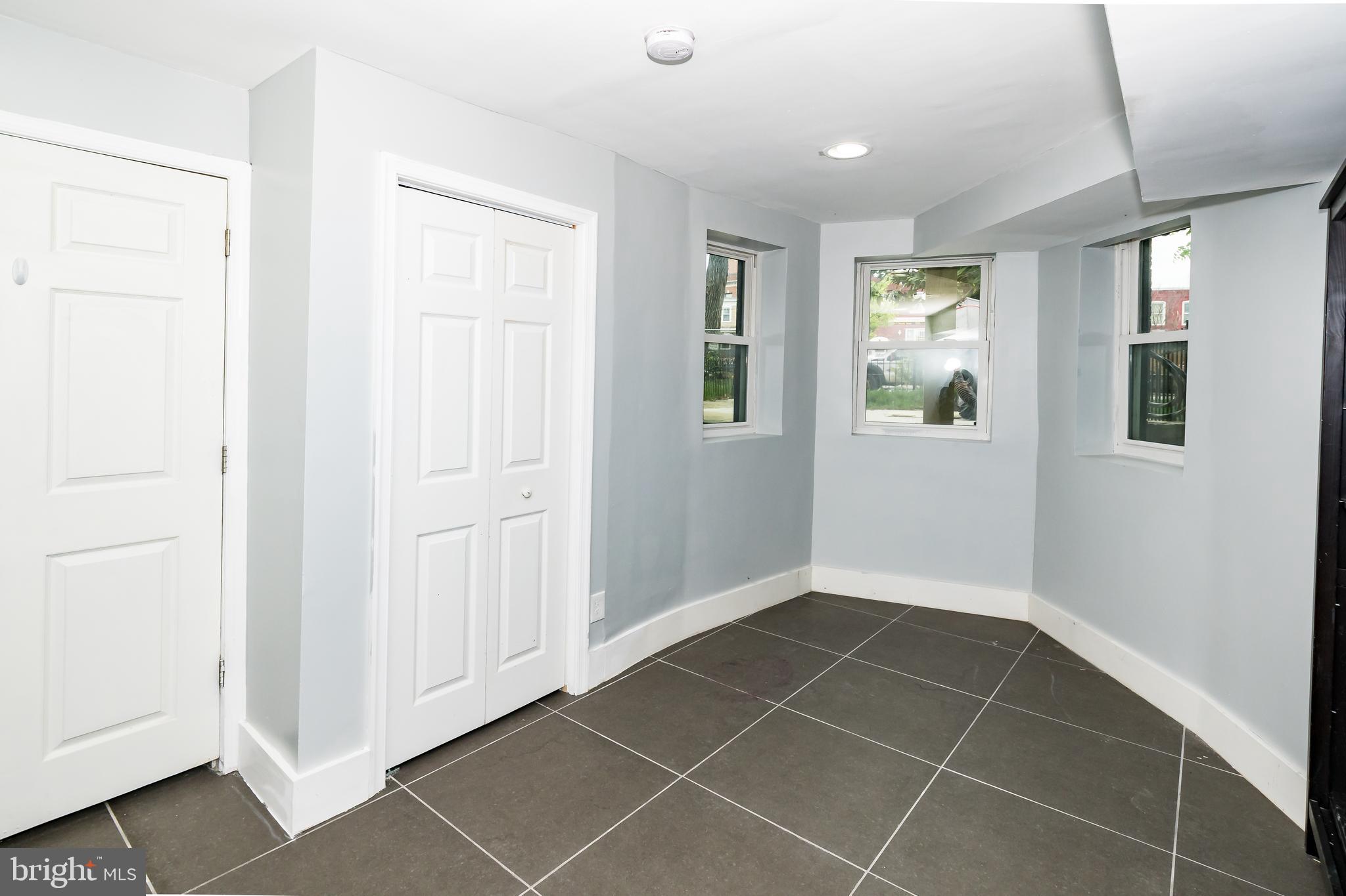 1427 New Jersey Avenue Northwest Washington, DC 20001 - Photo 25 of 29 a view of an empty room with closet and a window