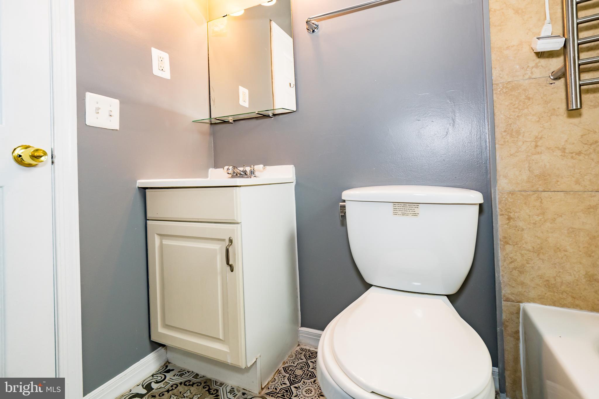 1427 New Jersey Avenue Northwest Washington, DC 20001 - Photo 6 of 29 a bathroom with a toilet and a sink