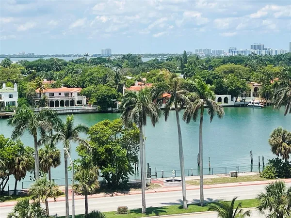 a view of a lake with a yard