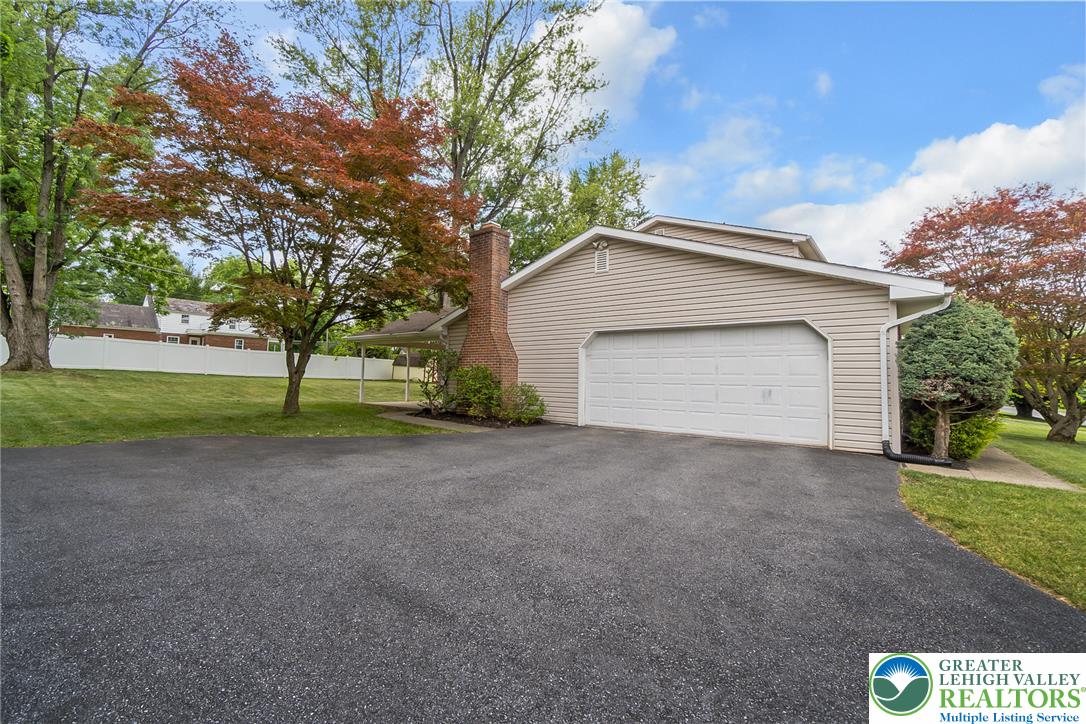 268 Apollo Drive Bethlehem, PA 18017 - Photo 47 of 56 An inviting exterior with a wide driveway leading to a convenient garage entrance.