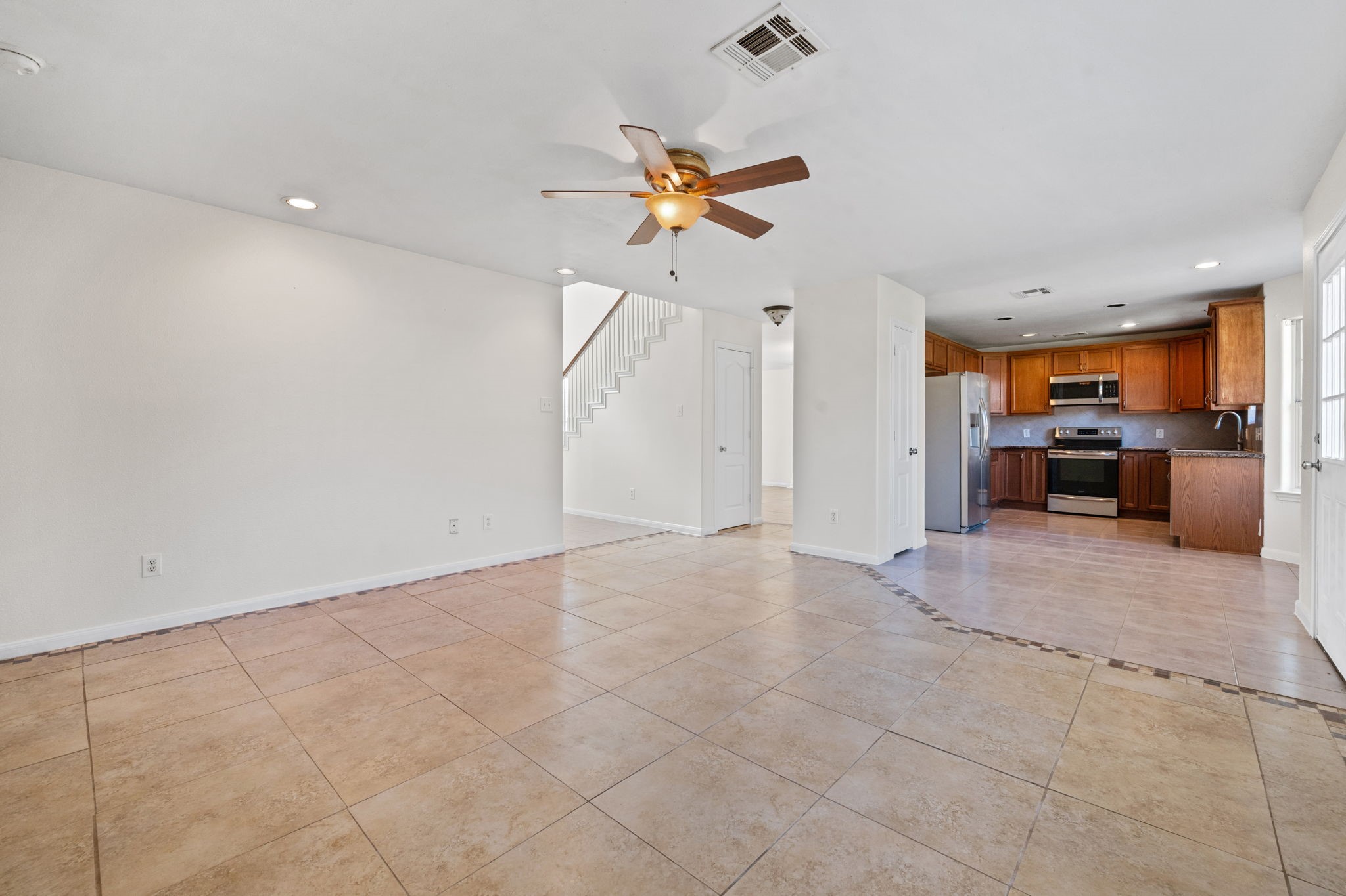 25785 Hickory Lane Splendora, TX 77372 - Photo 11 of 28 a view of kitchen and living room