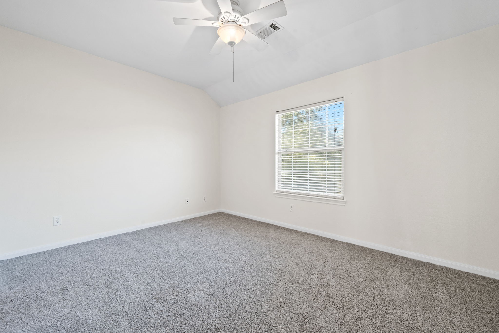 25785 Hickory Lane Splendora, TX 77372 - Photo 23 of 28 a view of an empty room with a window
