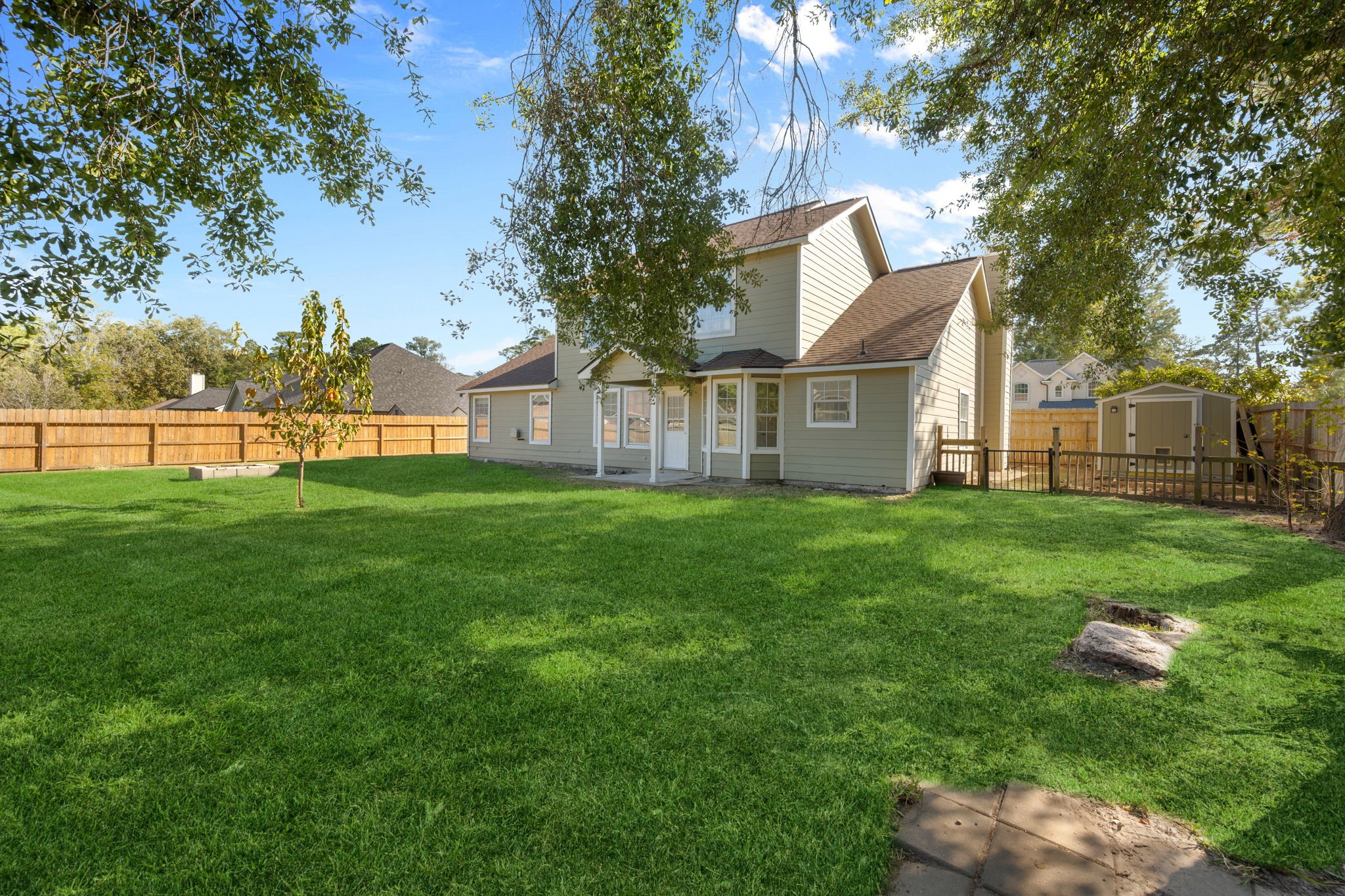 25785 Hickory Lane Splendora, TX 77372 - Photo 28 of 28 a front view of house with yard and green space