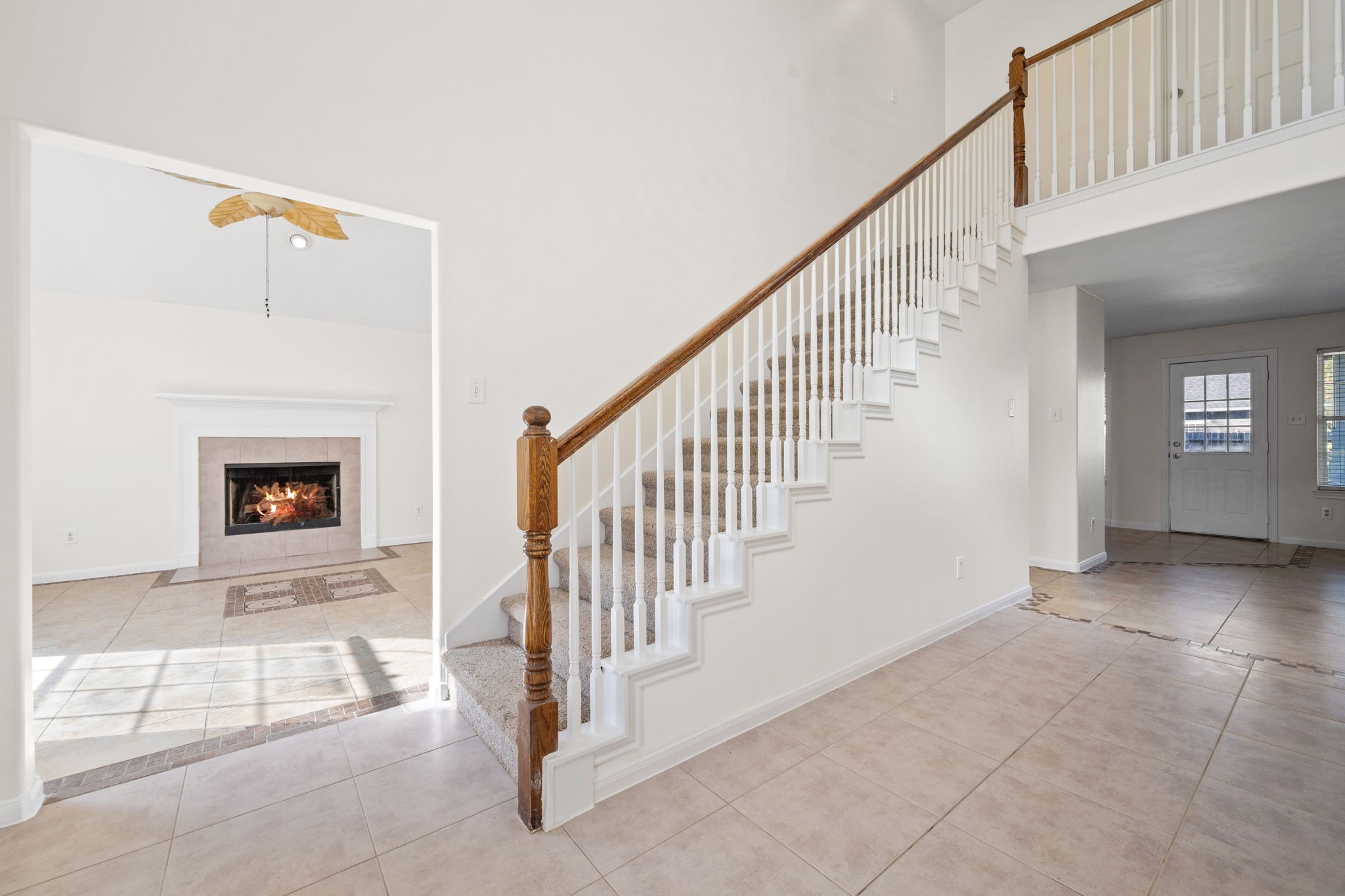 25785 Hickory Lane Splendora, TX 77372 - Photo 3 of 28 a view of entryway and hall with a fireplace