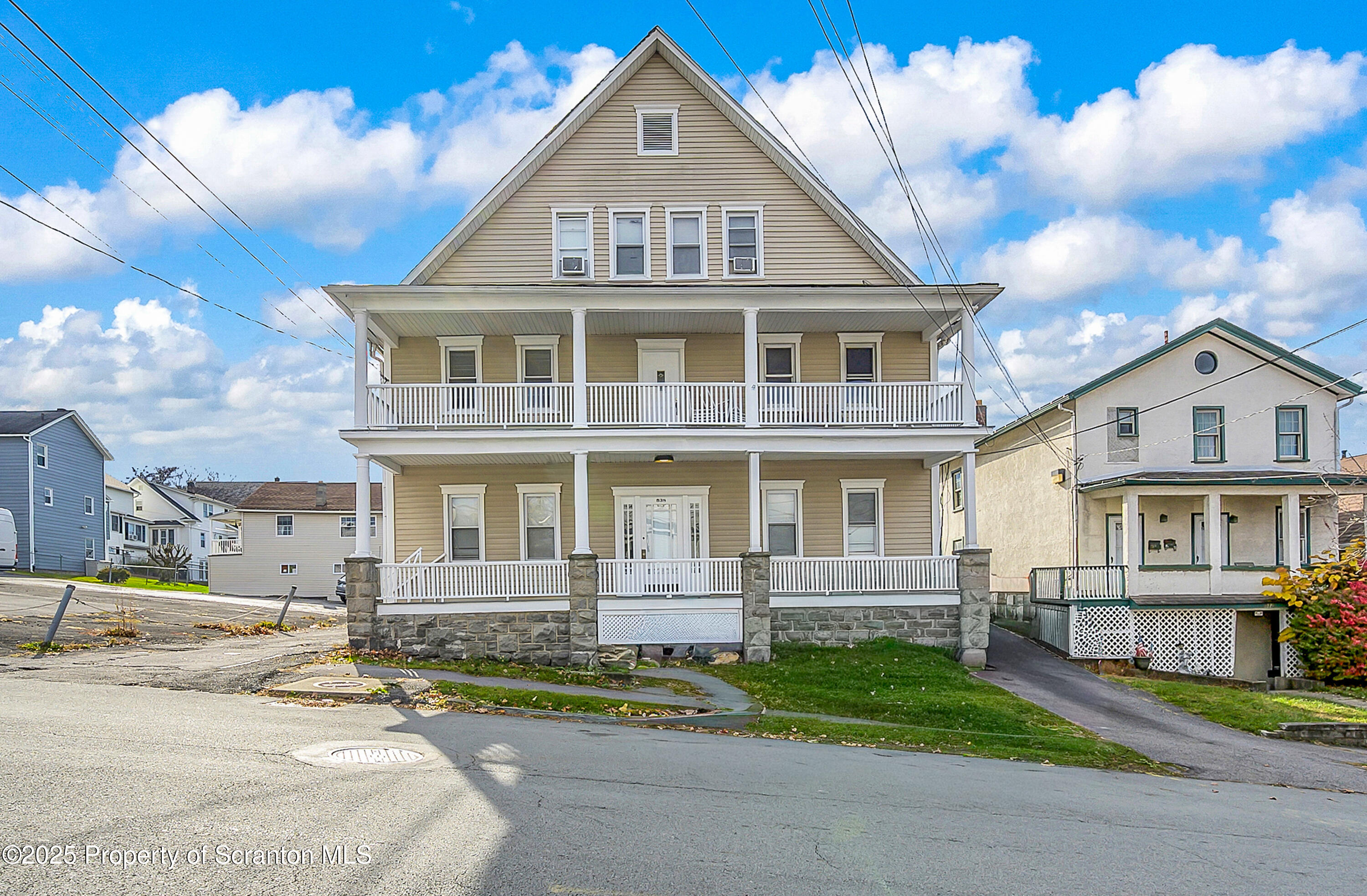 538 Birch Street, Unit 3 Scranton, PA 18505 - Photo 1 of 18 a front view of a house with a yard