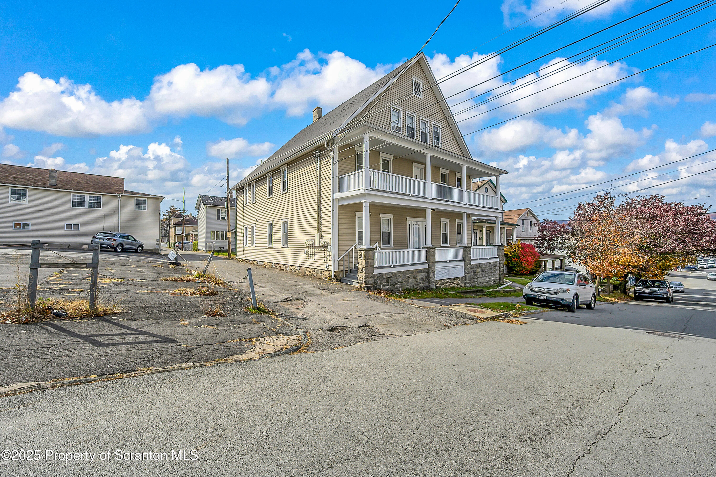 538 Birch Street, Unit 3 Scranton, PA 18505 - Photo 2 of 18 a view of a street with a car park in front of it