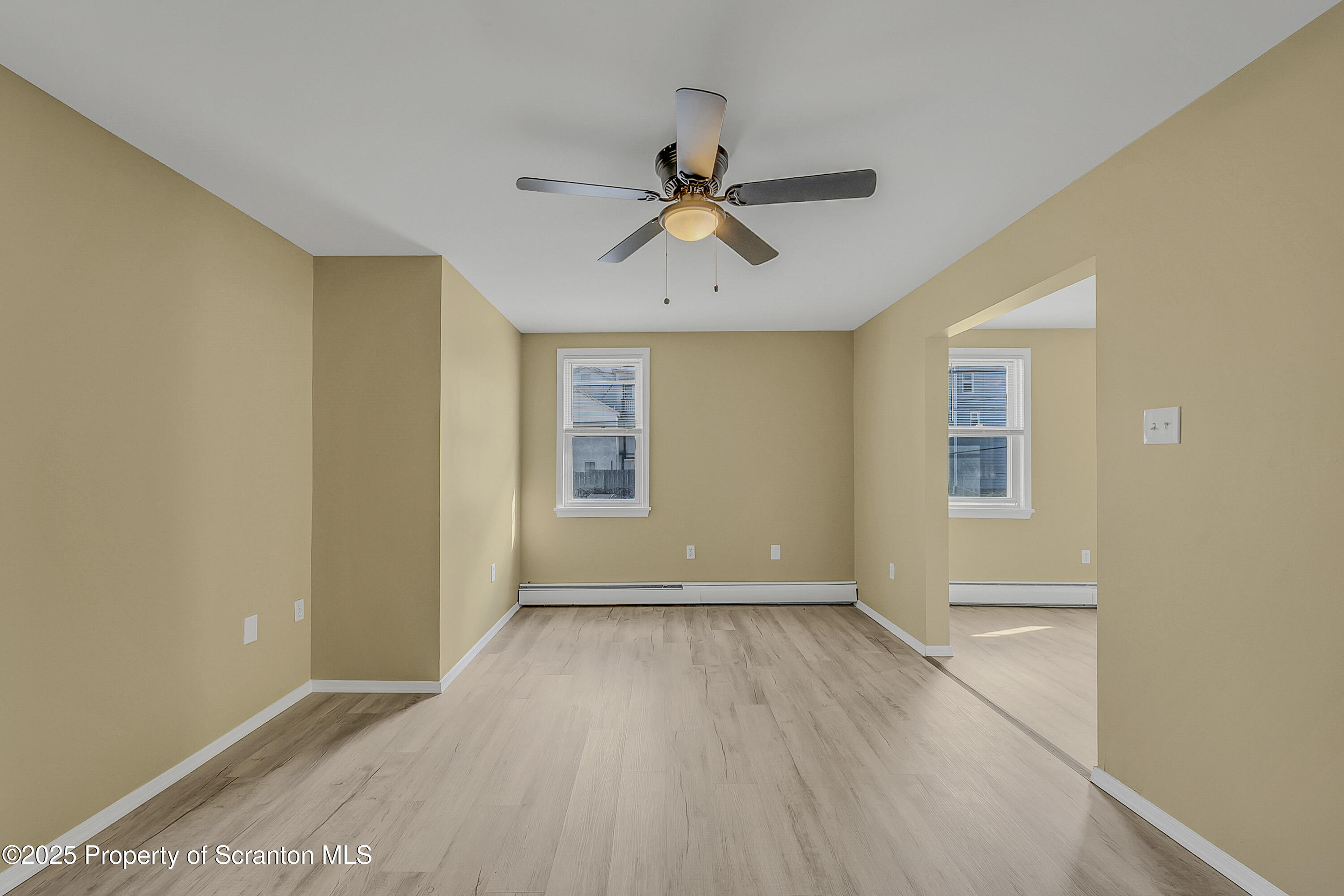 538 Birch Street, Unit 3 Scranton, PA 18505 - Photo 4 of 18 wooden floor in an empty room with a window