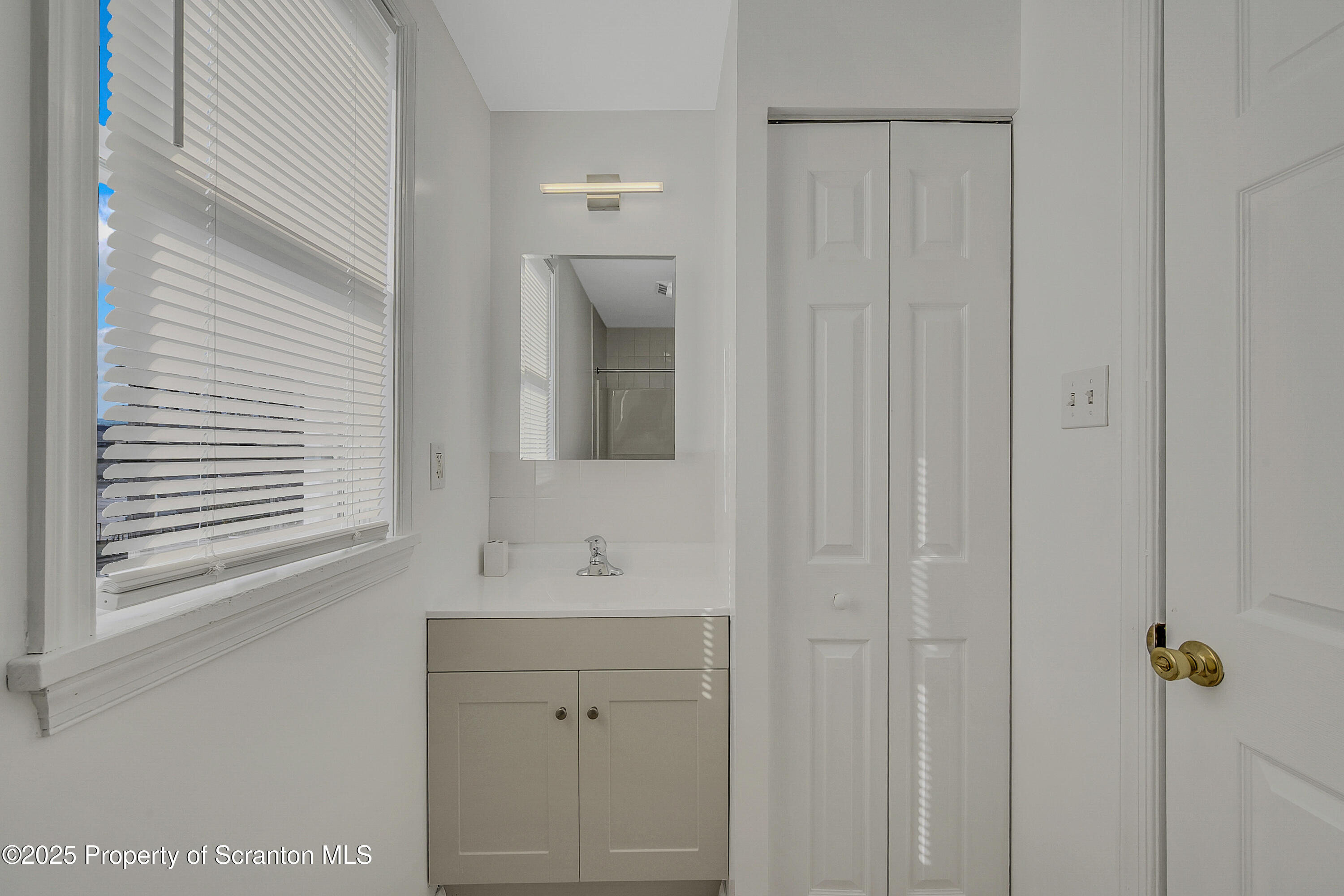538 Birch Street, Unit 3 Scranton, PA 18505 - Photo 10 of 18 a bathroom with a sink and a mirror