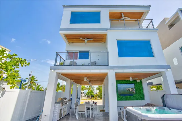 a front view of house with outdoor seating space