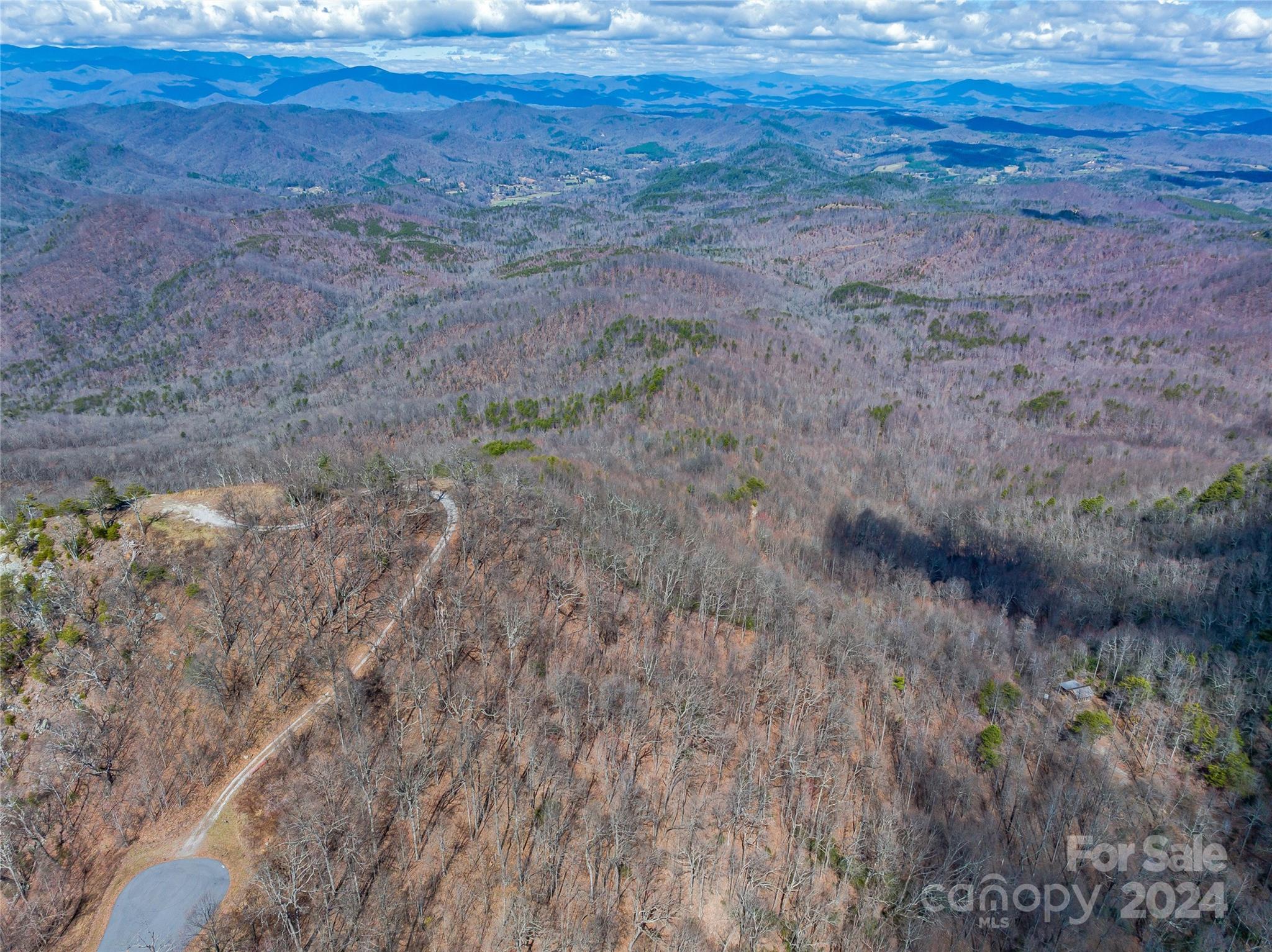 0 Devin Ridge Ln Union Mills, Unit 96 Union Mills, NC 28167 - Photo 22 of 30 a view of a dry yard with wooden fence