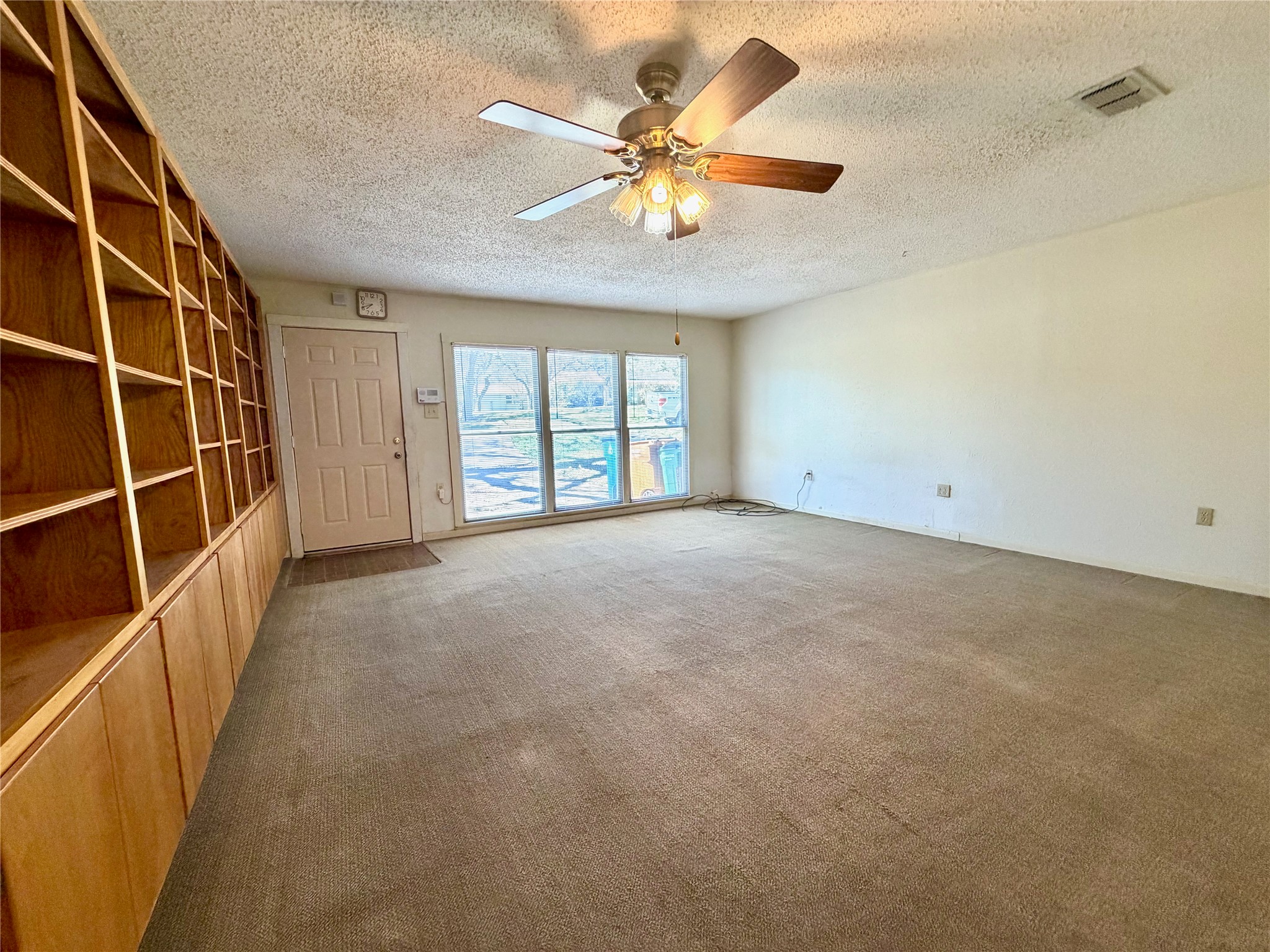 305 West Caddo Street Austin, TX 78753 - Photo 10 of 13 Additional living/flex space with separate entrance.