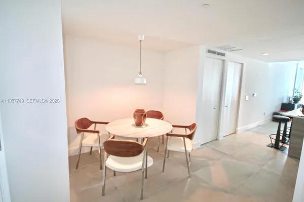 a living room with furniture and window