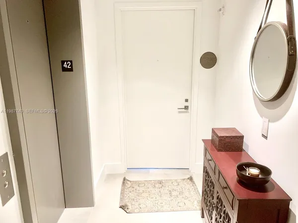 a table and chairs in a room