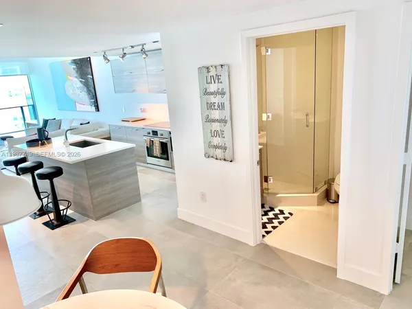 a view of livingroom with furniture and window