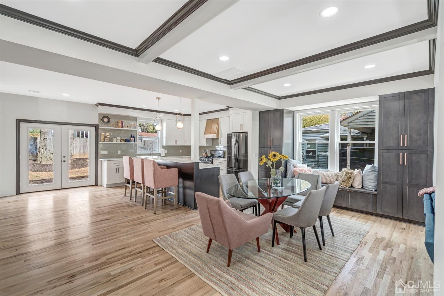 22 Stiles Road Edison, NJ 08817 - Photo 13 of 48 a view of a dining room with furniture window and wooden floor