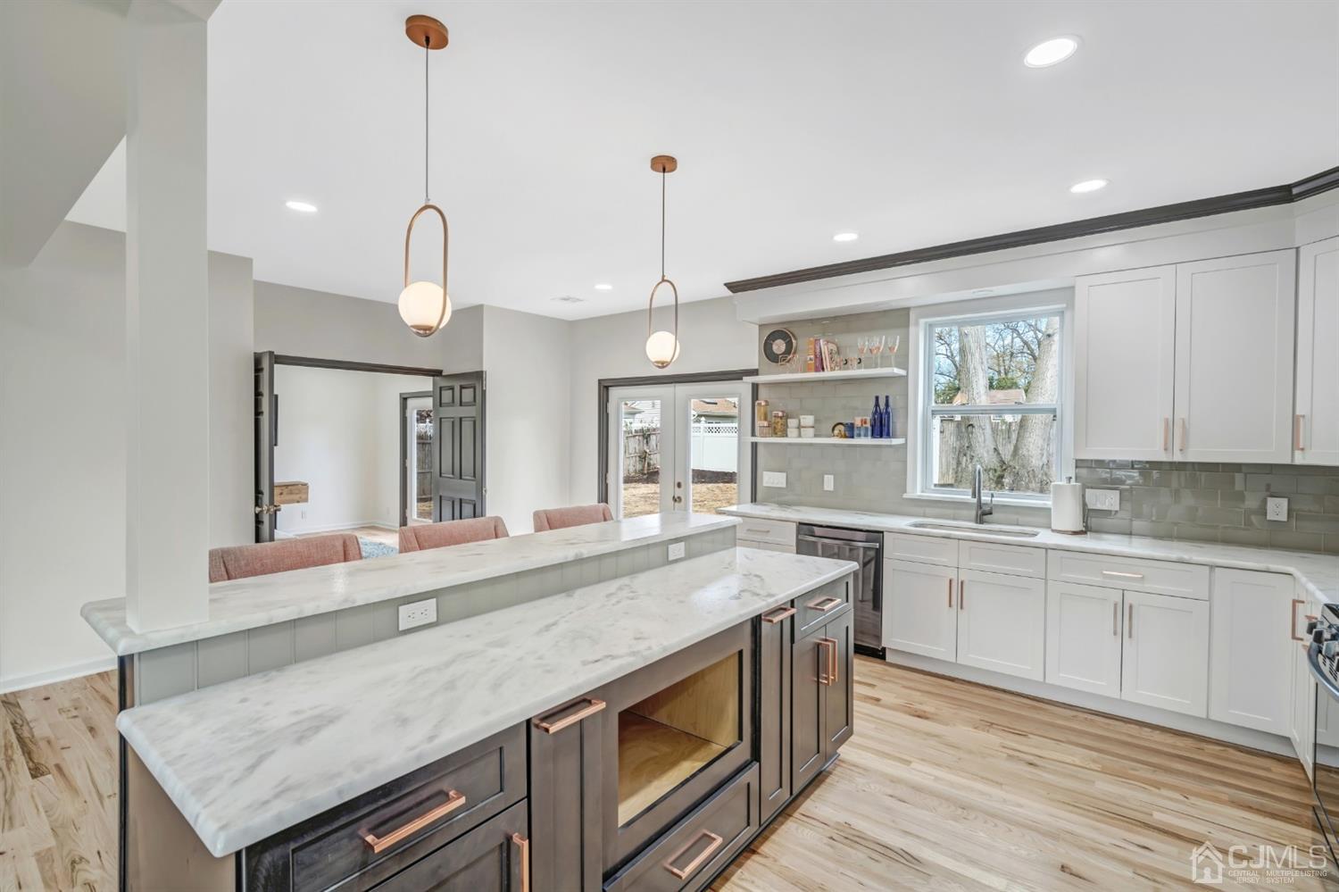 22 Stiles Road Edison, NJ 08817 - Photo 17 of 48 a kitchen with stainless steel appliances granite countertop a sink and stove top oven