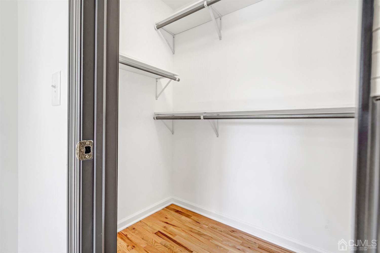22 Stiles Road Edison, NJ 08817 - Photo 31 of 48 a view of small space with racks on the wall