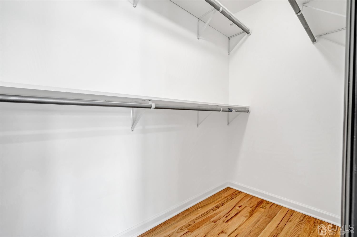 22 Stiles Road Edison, NJ 08817 - Photo 33 of 48 a view of a room with racks on the wall