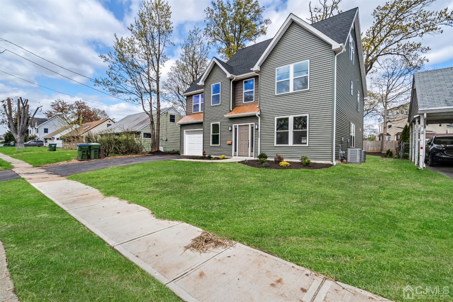 22 Stiles Road Edison, NJ 08817 - Photo 5 of 48 a front view of house with yard and green space