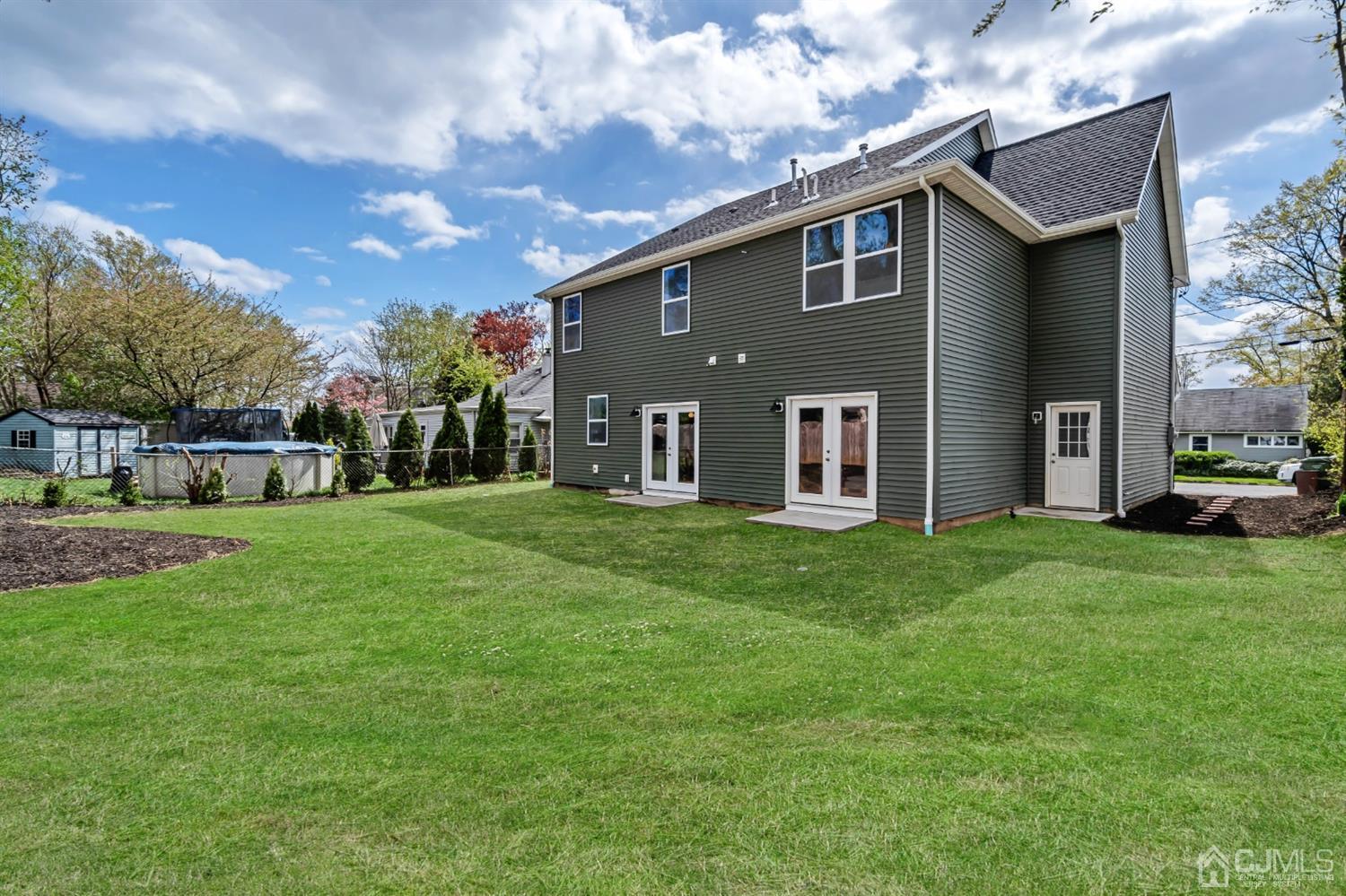 22 Stiles Road Edison, NJ 08817 - Photo 43 of 48 a front view of house with yard and green space