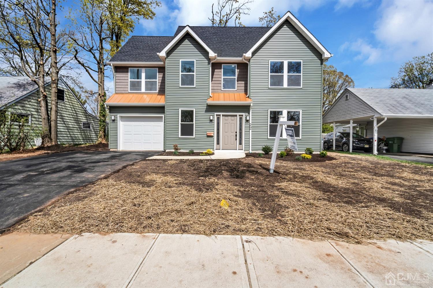 22 Stiles Road Edison, NJ 08817 - Photo 47 of 48 a front view of a house with a yard