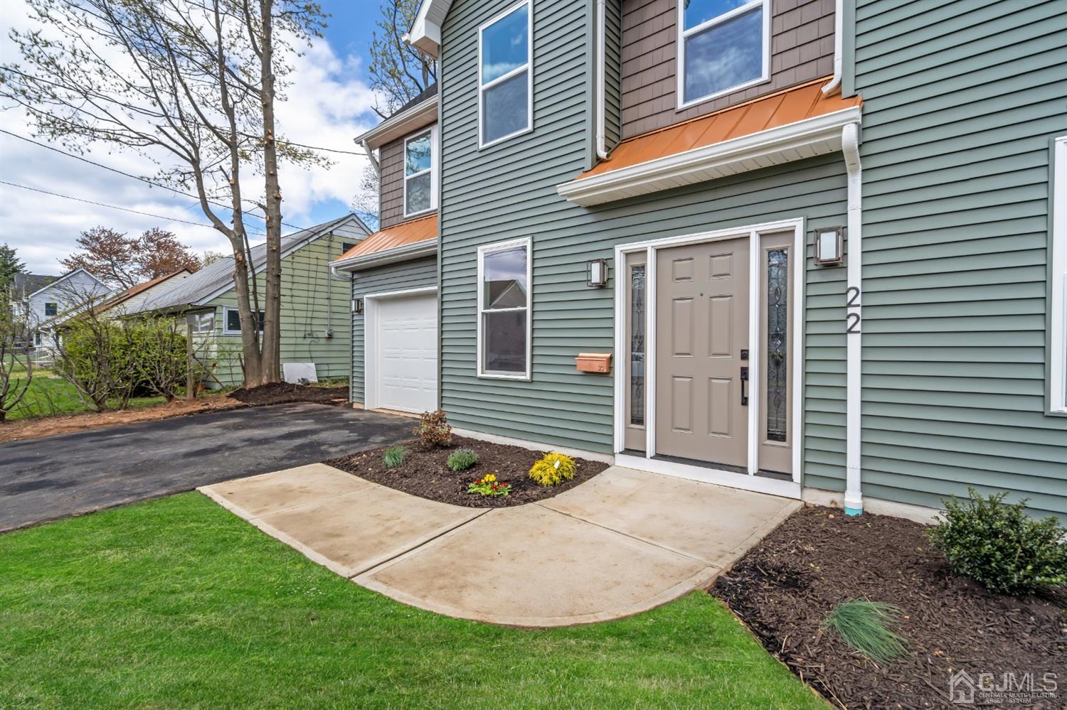 22 Stiles Road Edison, NJ 08817 - Photo 6 of 48 a front view of a house with garden