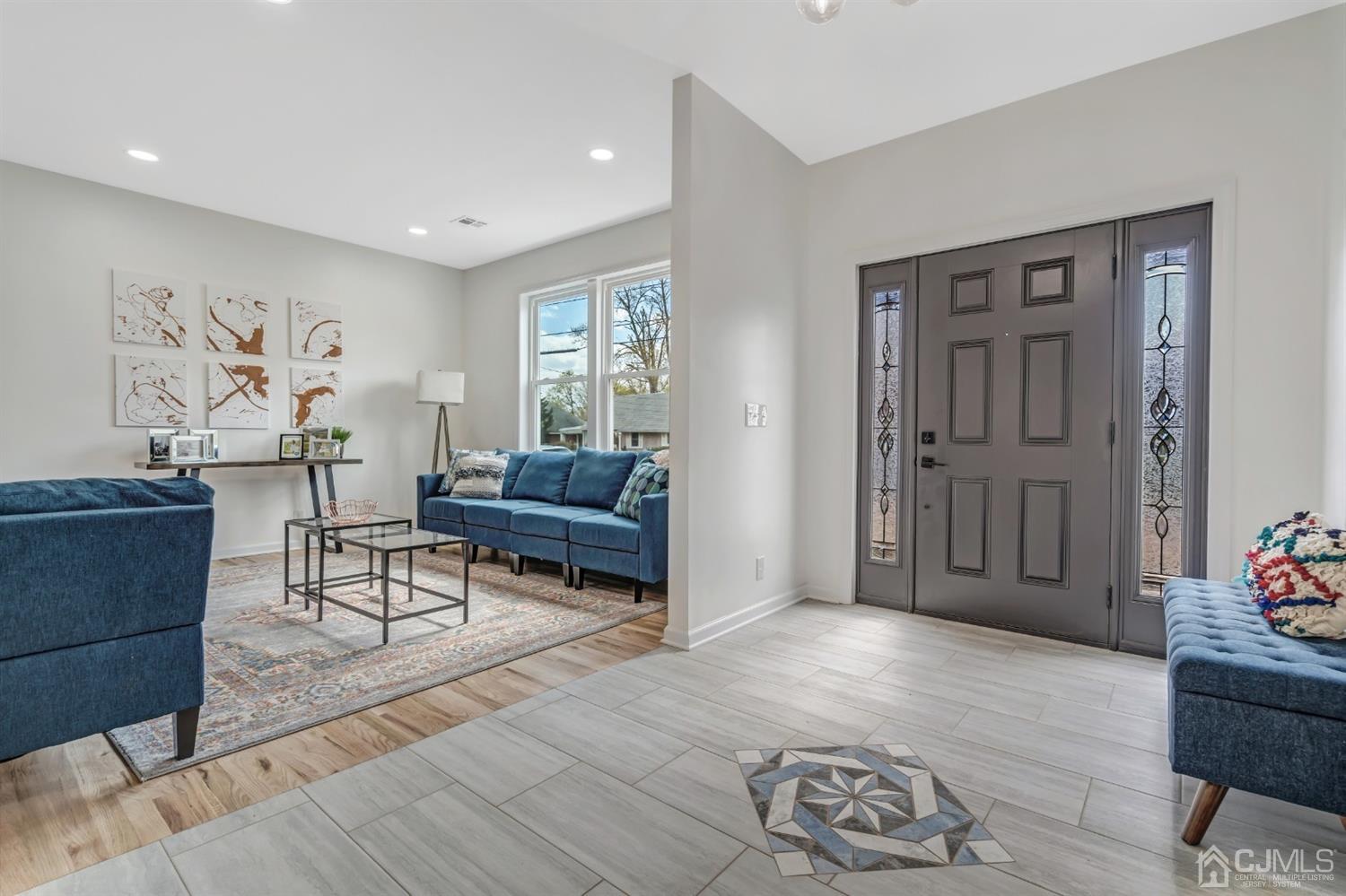 22 Stiles Road Edison, NJ 08817 - Photo 9 of 48 a living room with furniture and wooden floor